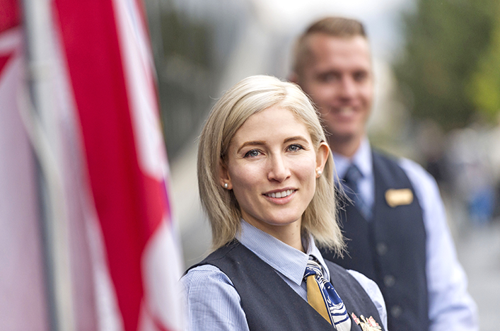 A Tour Director smiling