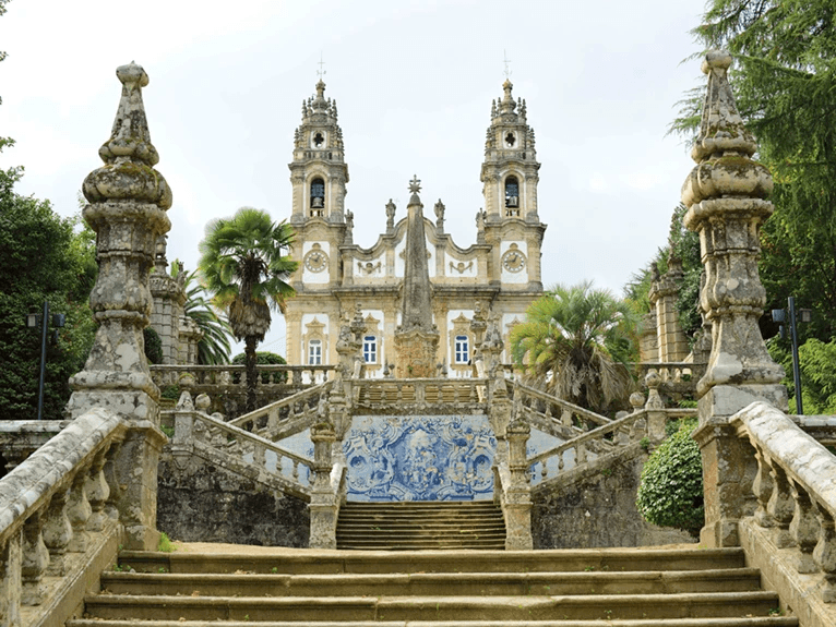 A series of steps ascending towards the historic Our Lady of Remedies Church, in the town of Lamego, Portugal.