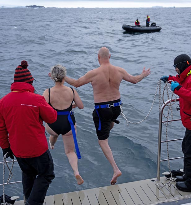 Scenic Eclipse guests doing the Polar Plunge in East Antarctica
