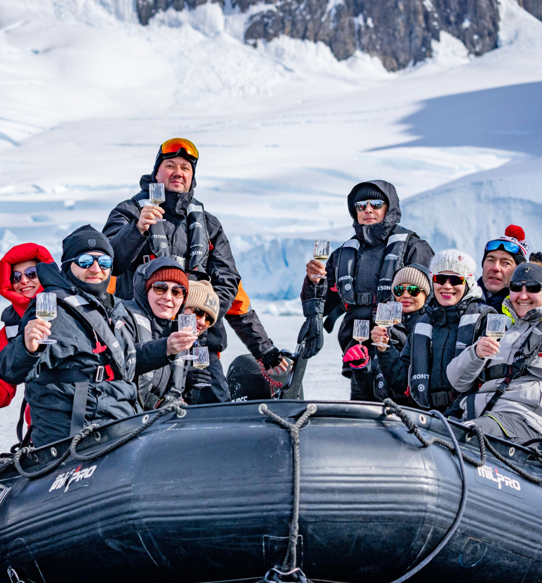 Champagne reception aboard zodiac in Antarctica