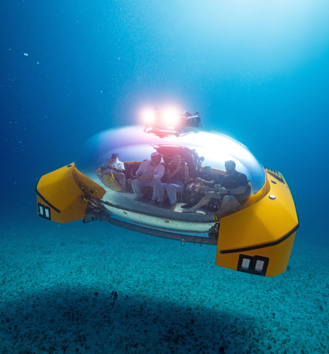 Scenic Neptune submersible exploring underwater