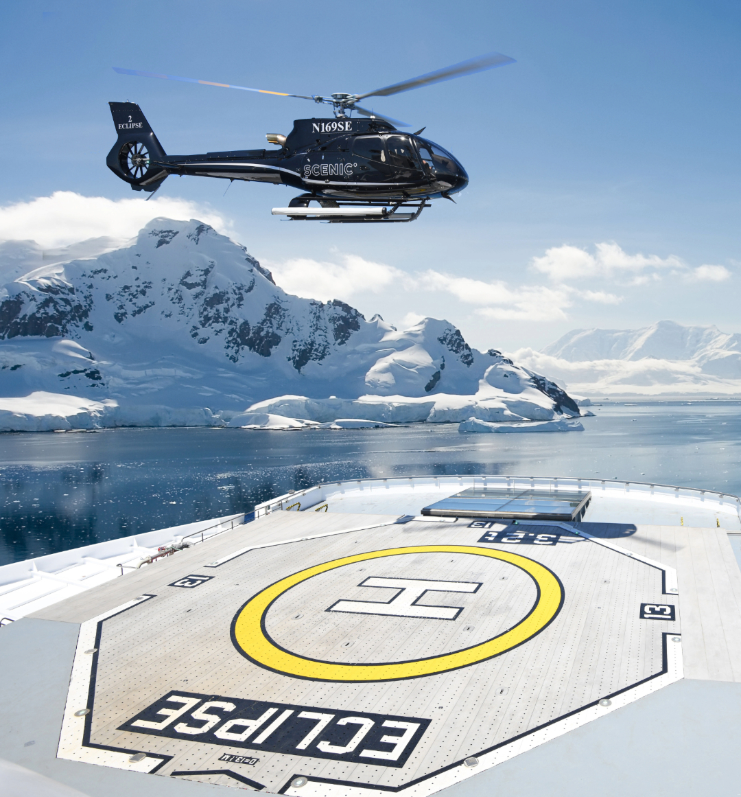 Helicopter landing on Scenic Eclipse helipad