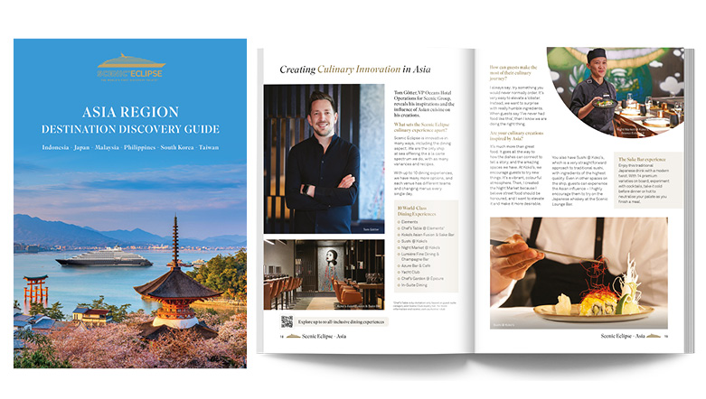 The front cover of the Asia Region Discovery Voyage Guide. The sky is blue and a mountain range can be seen in the background.