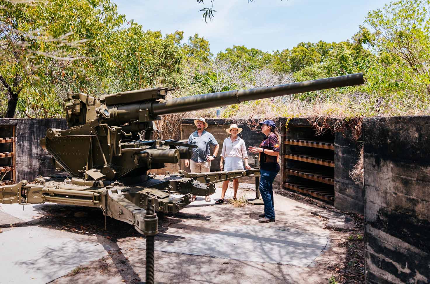 Tour Director showing a couple around on an excursion