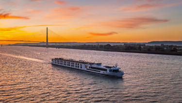Scenic ship cruising along a river