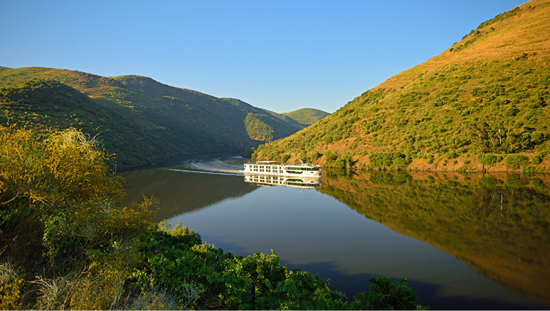 luxury river cruise ship sailing down the Douro river