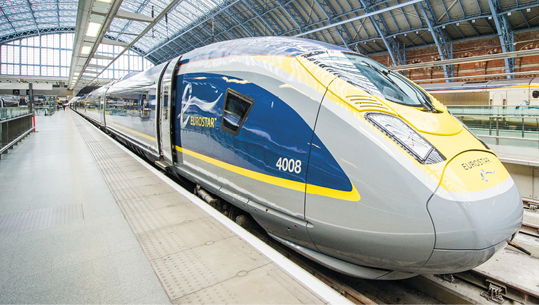 Front end of a Eurostar train in a terminal waiting to depart.