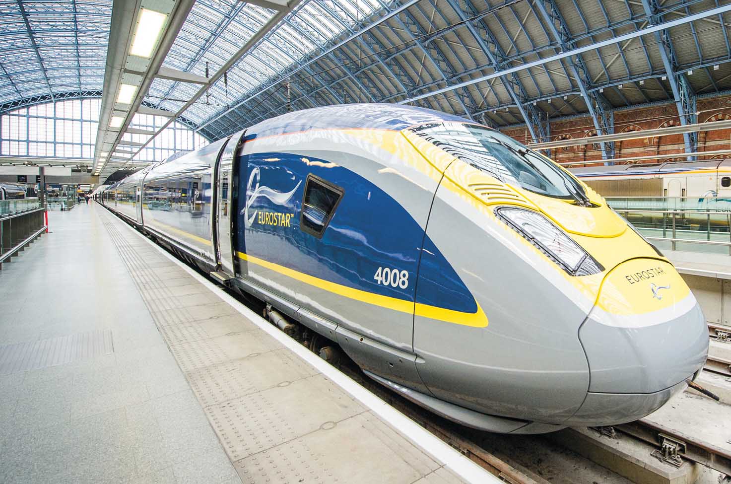 Front end of a Eurostar train in a terminal waiting to depart.
