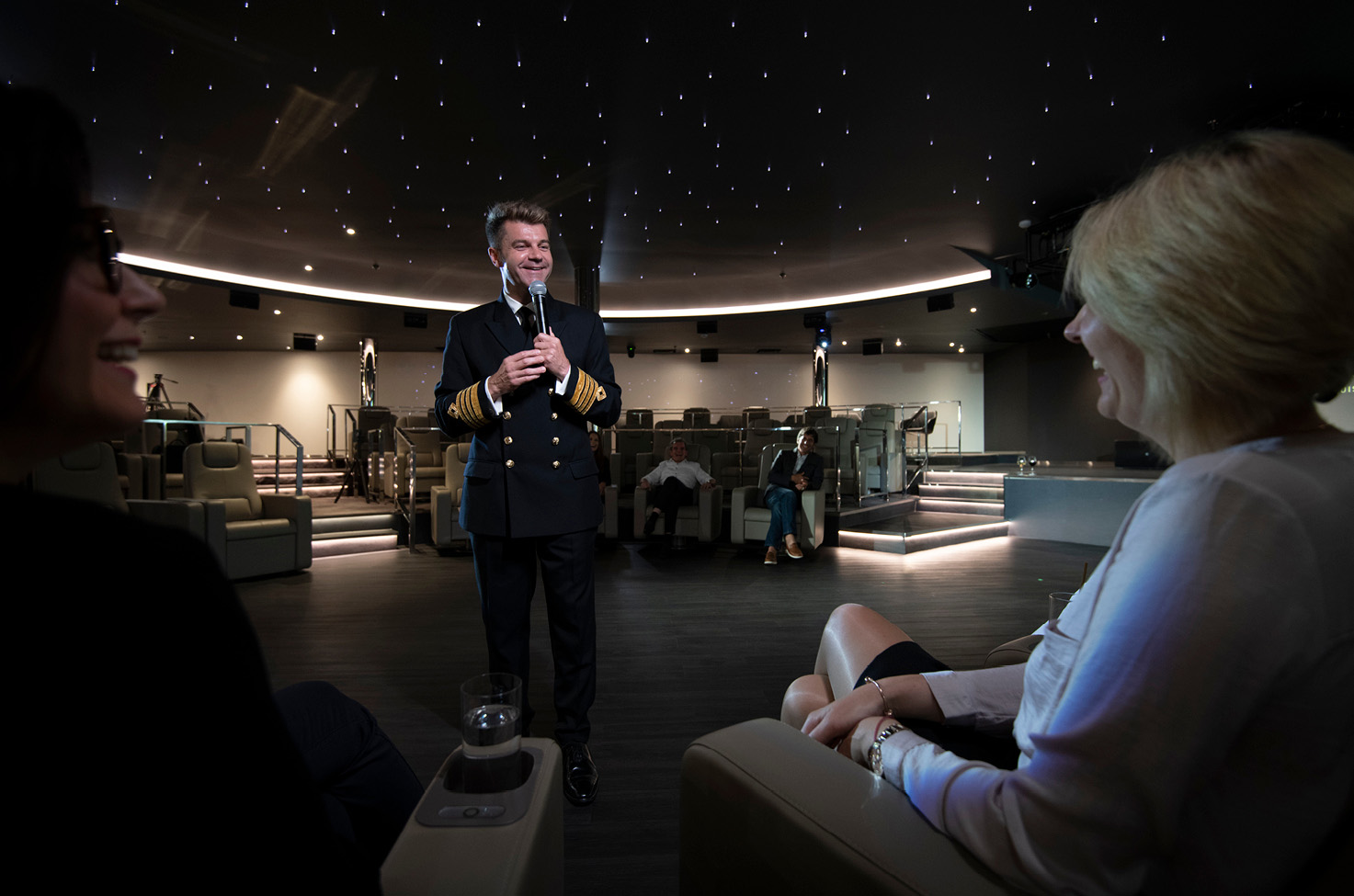 Ship Captain presenting in a theatre